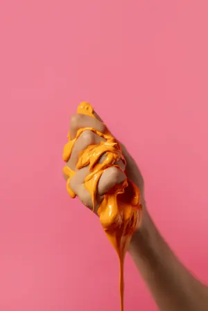 orange slime in hand